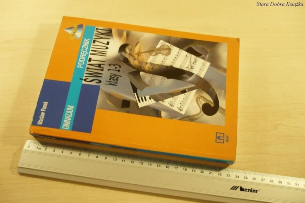 Wyjątkowa oferta ŚWIAT MUZYKI KLASY 1-3 GIMNAZJUM PODRĘCZNIK (1999)