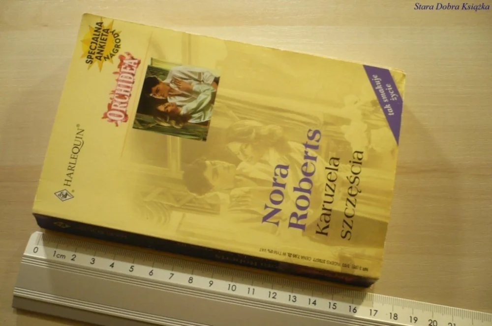 Sprawdź teraz KARUZELA SZCZĘŚCIA - Nora Roberts (2003)
